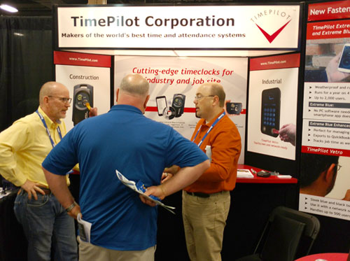TimePilot makes a splash at the Fastenal show: CEO Doug Marsh (left) answers questions about TimePilot systems from attendees at the Fastenal Customer Industrial & Construction Expo last month in Nashville. TimePilot makes a splash at the Fastenal show: CEO Doug Marsh (left) answers questions about TimePilot systems from attendees at the Fastenal Customer Industrial & Construction Expo last month in Nashville.