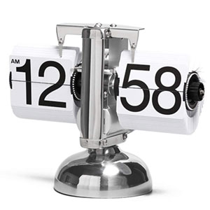 The clock is powered by a single D cell battery. Turn the knob at right to adjust the time.